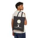 The rabbit looking at Earth from the moon Cotton Canvas Tote Bag